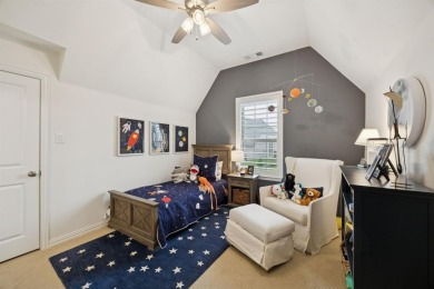 Discover refined living in this immaculate four-bedroom on Lantana Golf Club in Texas - for sale on GolfHomes.com, golf home, golf lot