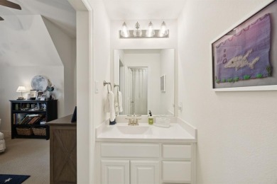 Discover refined living in this immaculate four-bedroom on Lantana Golf Club in Texas - for sale on GolfHomes.com, golf home, golf lot