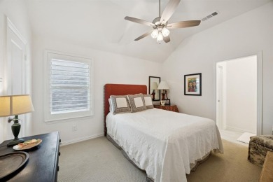 Discover refined living in this immaculate four-bedroom on Lantana Golf Club in Texas - for sale on GolfHomes.com, golf home, golf lot
