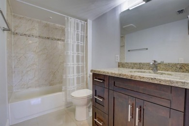 Beautifully Renovated, Spacious 2-Bed/2-Bath, Garden/pool area on Flamingo Lakes Country Club in Florida - for sale on GolfHomes.com, golf home, golf lot