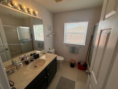 Beautiful lakefront single-family home in the sought-after Grand on Palm Beach Polo and Country Club in Florida - for sale on GolfHomes.com, golf home, golf lot