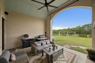 Discover refined living in this immaculate four-bedroom on Lantana Golf Club in Texas - for sale on GolfHomes.com, golf home, golf lot