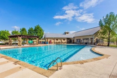 Perfectly positioned on the lush greenbelt backing up to over 20 on Lantana Golf Club in Texas - for sale on GolfHomes.com, golf home, golf lot