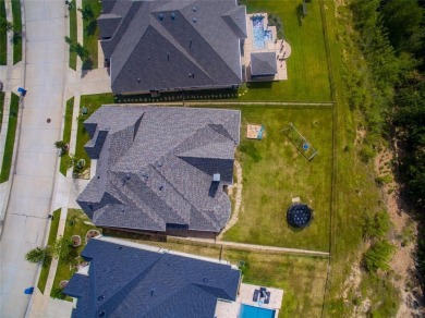 Perfectly positioned on the lush greenbelt backing up to over 20 on Lantana Golf Club in Texas - for sale on GolfHomes.com, golf home, golf lot