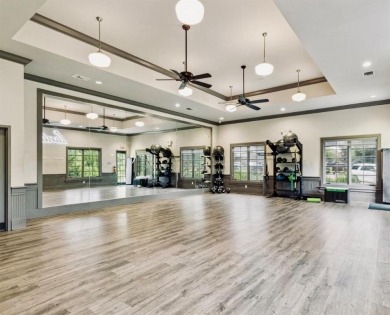 Perfectly positioned on the lush greenbelt backing up to over 20 on Lantana Golf Club in Texas - for sale on GolfHomes.com, golf home, golf lot