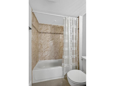 Beautifully Renovated, Spacious 2-Bed/2-Bath, Garden/pool area on Flamingo Lakes Country Club in Florida - for sale on GolfHomes.com, golf home, golf lot