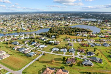 METICULOUSLY MAINTAINED 3 BEDROOM, 2 BATH, 2-CAR GARAGE POOL on Deep Creek Golf Club in Florida - for sale on GolfHomes.com, golf home, golf lot