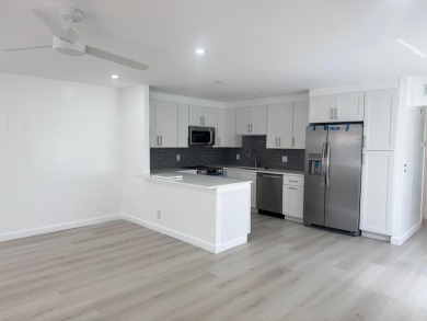 Fully renovated 1BR/1.5BA villa in the quiet Valencia section of on Kings Point Golf -Flanders Way in Florida - for sale on GolfHomes.com, golf home, golf lot