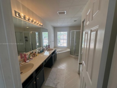 Beautiful lakefront single-family home in the sought-after Grand on Palm Beach Polo and Country Club in Florida - for sale on GolfHomes.com, golf home, golf lot