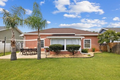 Nestled within Bid-A-Wee, a golf-cart friendly community of on Holiday Golf Club in Florida - for sale on GolfHomes.com, golf home, golf lot