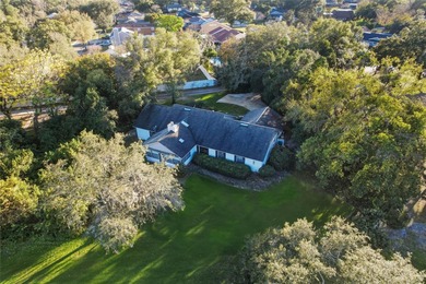 Nestled on a spectacular lot overlooking the first hole of on Orange Tree Golf Club in Florida - for sale on GolfHomes.com, golf home, golf lot