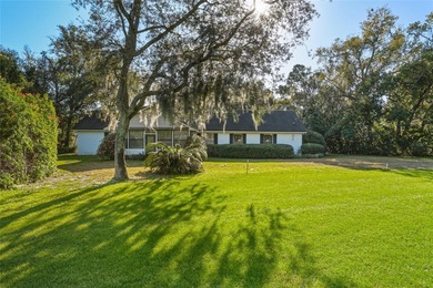 Nestled on a spectacular lot overlooking the first hole of on Orange Tree Golf Club in Florida - for sale on GolfHomes.com, golf home, golf lot
