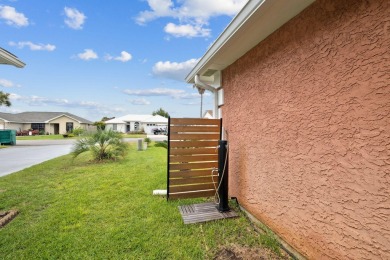 Nestled within Bid-A-Wee, a golf-cart friendly community of on Holiday Golf Club in Florida - for sale on GolfHomes.com, golf home, golf lot