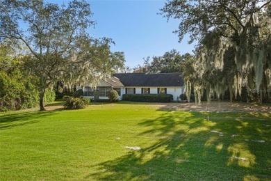 Nestled on a spectacular lot overlooking the first hole of on Orange Tree Golf Club in Florida - for sale on GolfHomes.com, golf home, golf lot