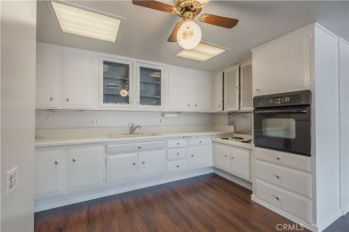 Located in the desirable 55+ community of Leisure World, this on Leisure World Seal Beach Golf Course in California - for sale on GolfHomes.com, golf home, golf lot