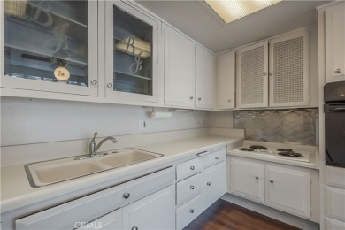 Located in the desirable 55+ community of Leisure World, this on Leisure World Seal Beach Golf Course in California - for sale on GolfHomes.com, golf home, golf lot