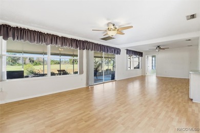 Discover this spacious 4-bed, 3-bath home at 818 N Country Club on Plantation Inn and Golf Resort  in Florida - for sale on GolfHomes.com, golf home, golf lot