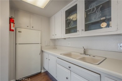 Located in the desirable 55+ community of Leisure World, this on Leisure World Seal Beach Golf Course in California - for sale on GolfHomes.com, golf home, golf lot