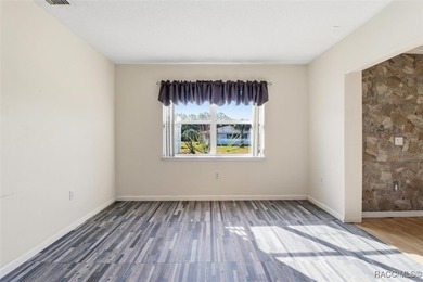 Discover this spacious 4-bed, 3-bath home at 818 N Country Club on Plantation Inn and Golf Resort  in Florida - for sale on GolfHomes.com, golf home, golf lot