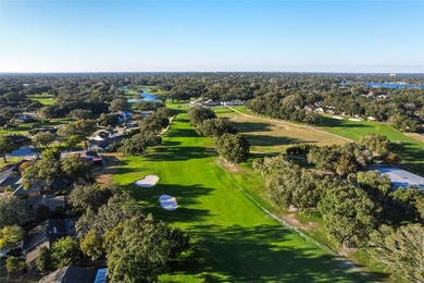 Nestled on a spectacular lot overlooking the first hole of on Orange Tree Golf Club in Florida - for sale on GolfHomes.com, golf home, golf lot