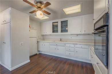 Located in the desirable 55+ community of Leisure World, this on Leisure World Seal Beach Golf Course in California - for sale on GolfHomes.com, golf home, golf lot