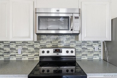 Discover this spacious 4-bed, 3-bath home at 818 N Country Club on Plantation Inn and Golf Resort  in Florida - for sale on GolfHomes.com, golf home, golf lot