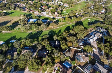 Nestled on a spectacular lot overlooking the first hole of on Orange Tree Golf Club in Florida - for sale on GolfHomes.com, golf home, golf lot