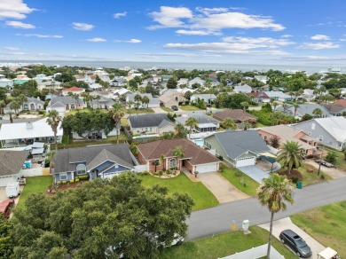 Nestled within Bid-A-Wee, a golf-cart friendly community of on Holiday Golf Club in Florida - for sale on GolfHomes.com, golf home, golf lot