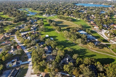 Nestled on a spectacular lot overlooking the first hole of on Orange Tree Golf Club in Florida - for sale on GolfHomes.com, golf home, golf lot