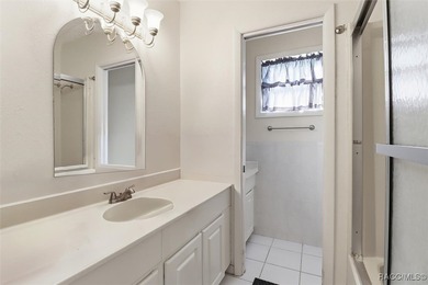 Discover this spacious 4-bed, 3-bath home at 818 N Country Club on Plantation Inn and Golf Resort  in Florida - for sale on GolfHomes.com, golf home, golf lot