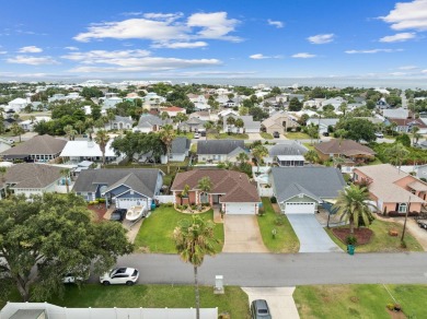 Nestled within Bid-A-Wee, a golf-cart friendly community of on Holiday Golf Club in Florida - for sale on GolfHomes.com, golf home, golf lot