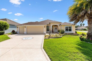 POOL HOME with GOLF CART GARAGE. On a desirable corner lot in on The Links of Spruce Creek in Florida - for sale on GolfHomes.com, golf home, golf lot