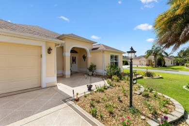 POOL HOME with GOLF CART GARAGE. On a desirable corner lot in on The Links of Spruce Creek in Florida - for sale on GolfHomes.com, golf home, golf lot