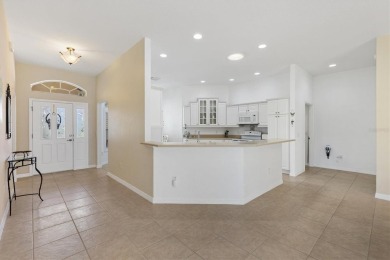 POOL HOME with GOLF CART GARAGE. On a desirable corner lot in on The Links of Spruce Creek in Florida - for sale on GolfHomes.com, golf home, golf lot