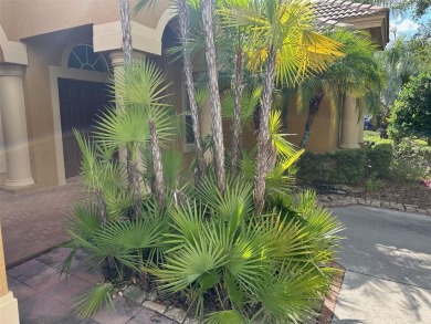 Captivating home located behind the gates of the tranquil Salano on Fox Hollow Golf Club in Florida - for sale on GolfHomes.com, golf home, golf lot