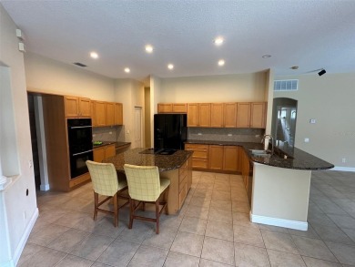 Captivating home located behind the gates of the tranquil Salano on Fox Hollow Golf Club in Florida - for sale on GolfHomes.com, golf home, golf lot