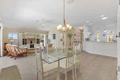 POOL HOME with GOLF CART GARAGE. On a desirable corner lot in on The Links of Spruce Creek in Florida - for sale on GolfHomes.com, golf home, golf lot