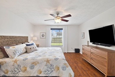 Nestled within Bid-A-Wee, a golf-cart friendly community of on Holiday Golf Club in Florida - for sale on GolfHomes.com, golf home, golf lot