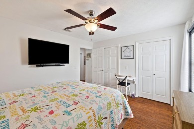 Nestled within Bid-A-Wee, a golf-cart friendly community of on Holiday Golf Club in Florida - for sale on GolfHomes.com, golf home, golf lot