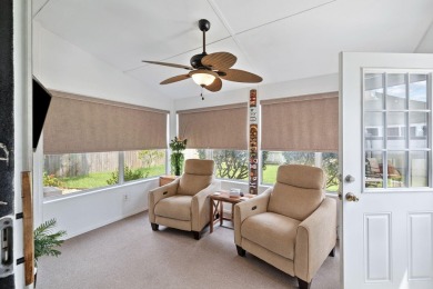 Nestled within Bid-A-Wee, a golf-cart friendly community of on Holiday Golf Club in Florida - for sale on GolfHomes.com, golf home, golf lot