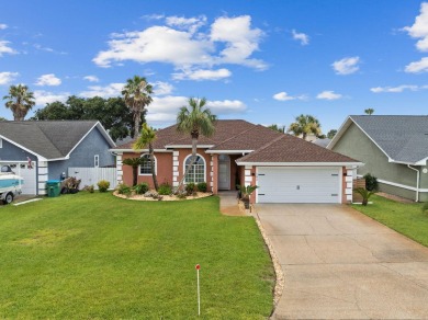 Nestled within Bid-A-Wee, a golf-cart friendly community of on Holiday Golf Club in Florida - for sale on GolfHomes.com, golf home, golf lot