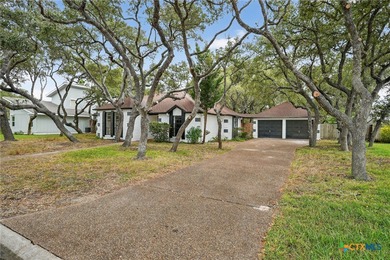 Welcome to 107 Cherry Hills Drive, located in the beautiful on Rockport Country Club in Texas - for sale on GolfHomes.com, golf home, golf lot