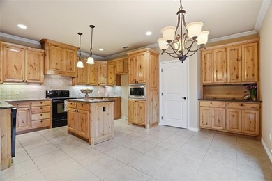 Nestled in a highly desirable gated community offering on Pecan Plantation Country Club in Texas - for sale on GolfHomes.com, golf home, golf lot