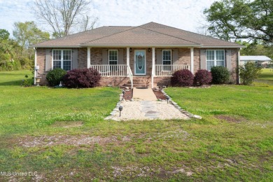 This could be your serene waterfront life! Live comfortably in on Pass Christian Isles Golf Club in Mississippi - for sale on GolfHomes.com, golf home, golf lot