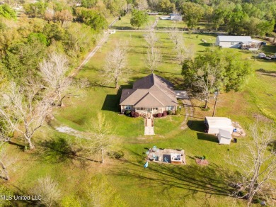 This could be your serene waterfront life! Live comfortably in on Pass Christian Isles Golf Club in Mississippi - for sale on GolfHomes.com, golf home, golf lot