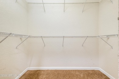 Resort style living in the golf community Palencia. 2bed/2 bath on The Palencia Club in Florida - for sale on GolfHomes.com, golf home, golf lot