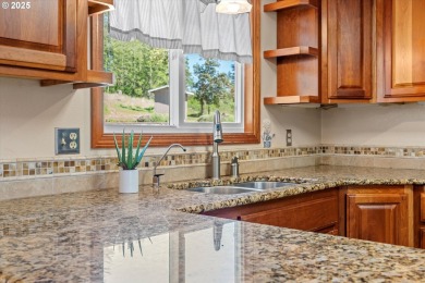 Tucked beside Mallard Creek Golf Course and surrounded by on Mallard Creek Golf and RV Resort in Oregon - for sale on GolfHomes.com, golf home, golf lot