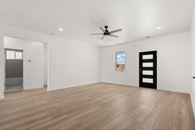 Welcome to 133 Chamartin, a stunning custom home ideally located on Tierra Del Sol Golf Course in New Mexico - for sale on GolfHomes.com, golf home, golf lot