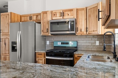 Welcome to 133 Chamartin, a stunning custom home ideally located on Tierra Del Sol Golf Course in New Mexico - for sale on GolfHomes.com, golf home, golf lot