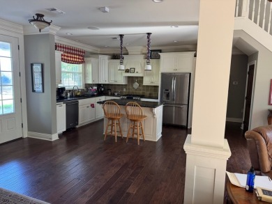 This beautiful 2 story home in Bailey's Bluff isa golf cart ride on Cypress Bend Golf Resort in Louisiana - for sale on GolfHomes.com, golf home, golf lot